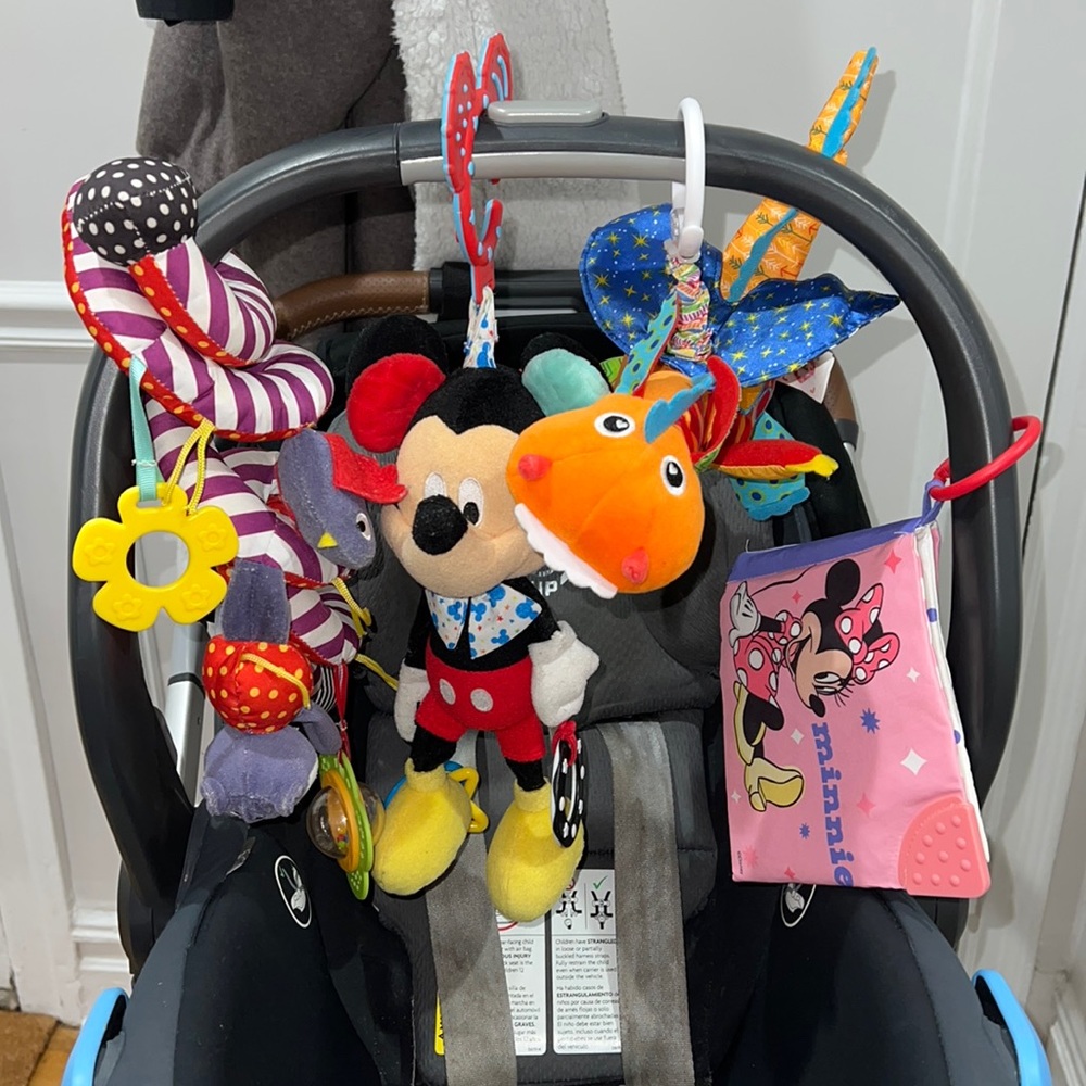 Four different Mickey Minnie Mouse Lamaze dragon car seat flip on toys